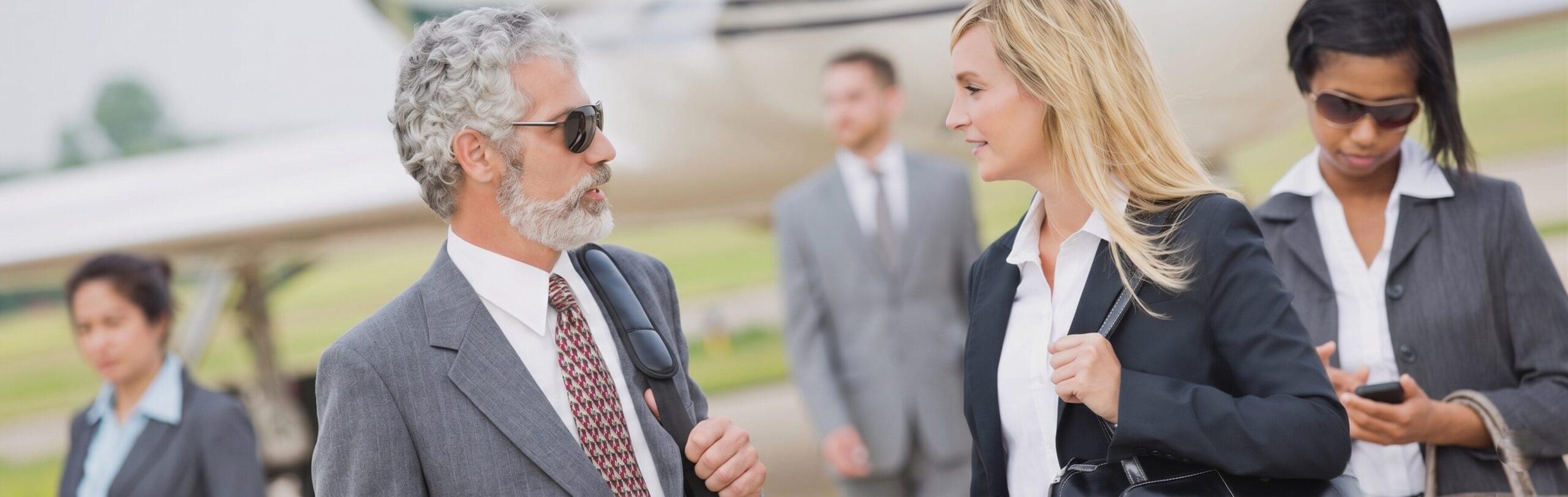 Business people at private jet airport, Chauffeur Service Washington DC